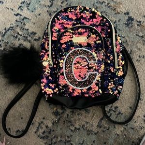 Brand new Justice mini backpack with initial C.